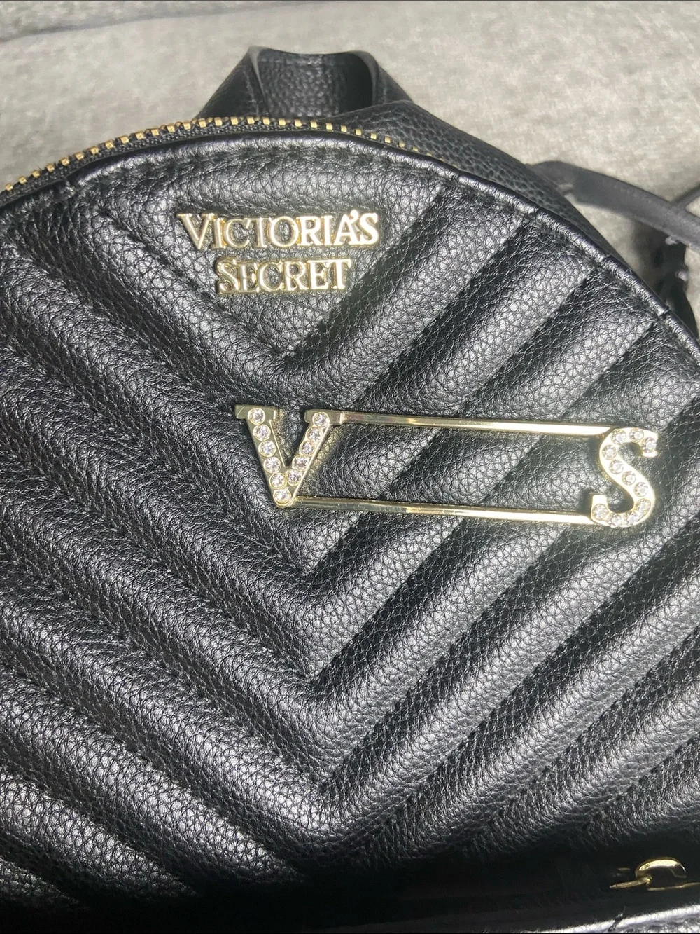 Victoria's Secret Black Quilted Mini Backpack with Gold Accents and Red Detail